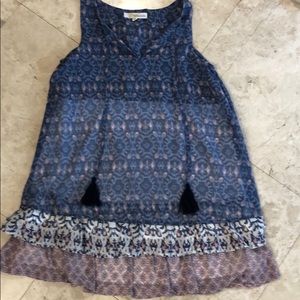 Rewind sleeveless v neck tassel tie detail top